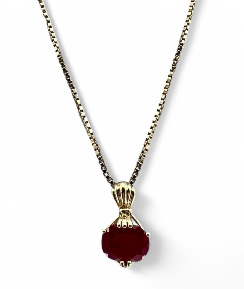 14K Pink Sapphire Necklace: 14K Pink Sapphire Necklace. Chain marked "Milor 14KT Italy," 4.2g. Pendant marked 14K, 2.8g. Chain length 22.0in. Pendant 0.87 x 0.49in. All measurements are approximate. ALL CREDIT CARDS WILL BE MANU