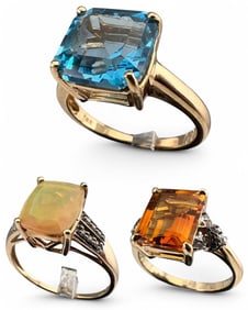 Three 10K Topaz, Opal & Citrine Rings
