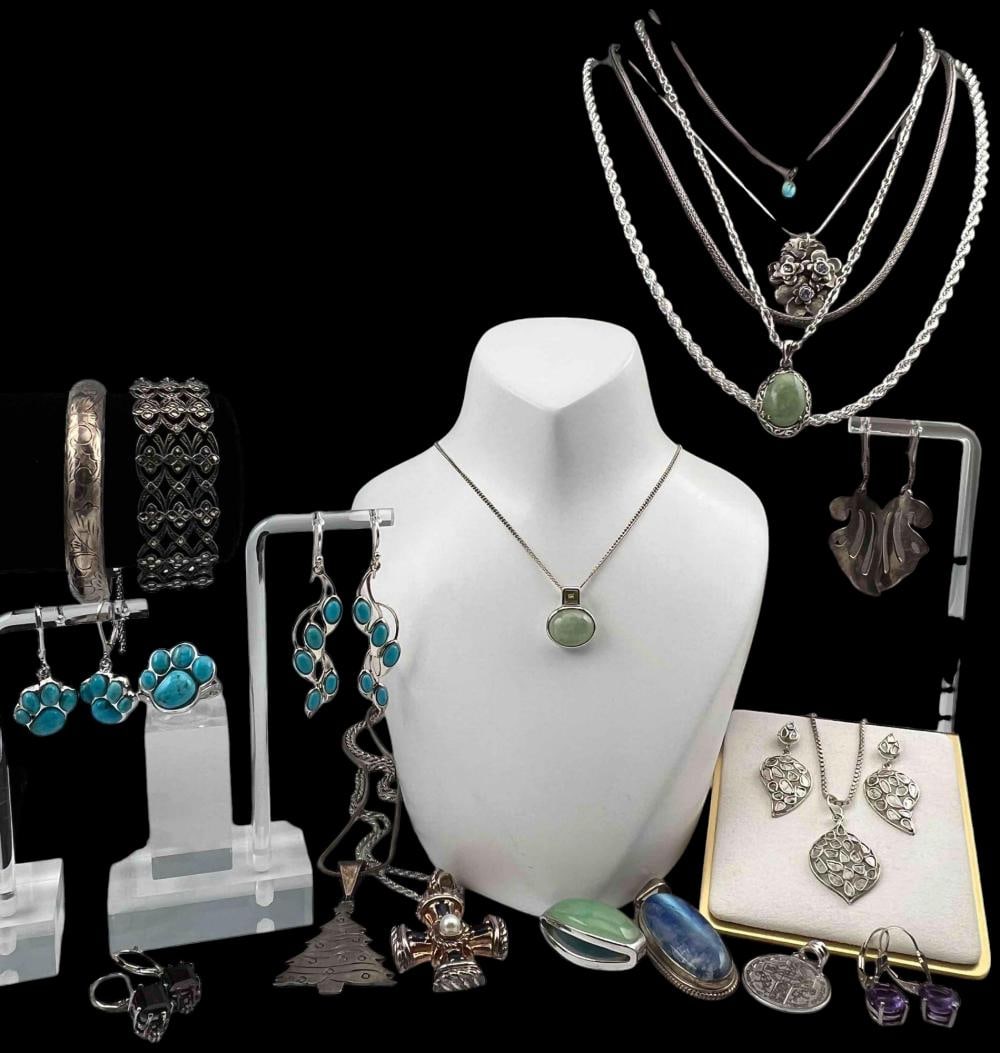 Lot Of Sterling Silver Jewelry: Lot Of Sterling Silver Jewelry, 230.6g. Includes Bracelets, necklaces, pendants, and earrings. Largest piece (bracelet) approximately 6.75L x 0.875W in. Smallest (pendant) approximately 0.375L x 0.187