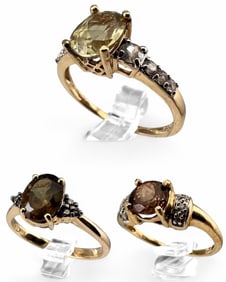 Three 10K Topaz & Tourmaline Rings