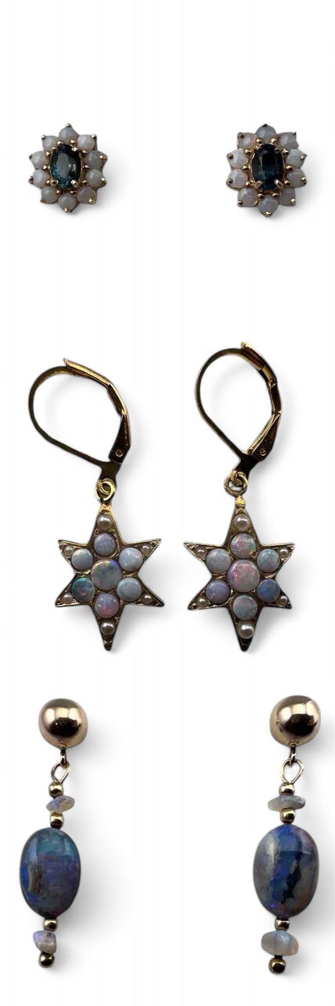 Three Pairs 10K, 9K Opal Earrings: Three Pairs 10K, 9K Opal Earrings. Opal blue topaz earrings marked, 10K, 2.3g. Opal drop earrings unmarked, test as 10K, 2.2g. Star shaped earrings marked 9C, test as 9 karat, leverback finding tests