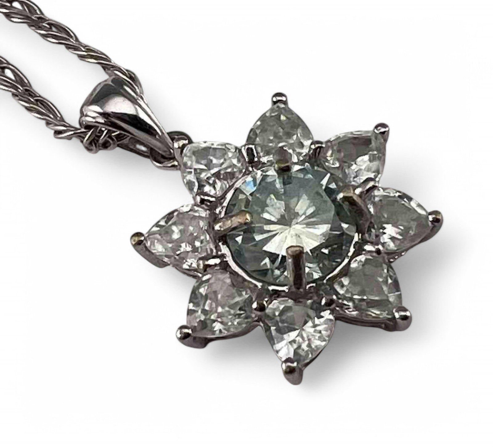 10K Moissanite White Sapphire Necklace: 10K Moissanite White Sapphire Necklace, 4.0g. Marked 10K. Pendant 1.0L x 0.68W in. (including bale). Moissanite 7.0mm. Chain length 19.875in. All measurements are approximate. ALL CREDIT CARDS WILL BE