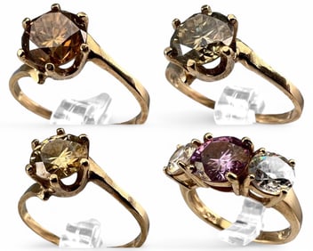 Four 10K Moissanite Rings
