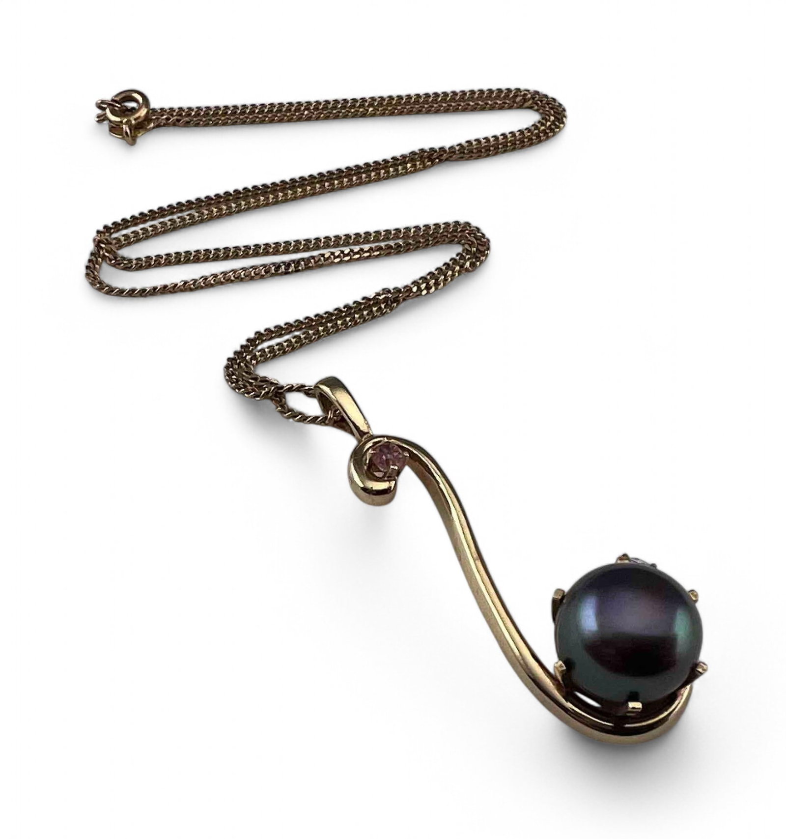 14K Black Pearl White Sapphire Necklace: 14K Black Pearl White Sapphire Necklace, 7.9g. Marked 14KT. Pendant approximately 1.7L x 0.54W in. Pearl 10.3mm. White sapphire 3.4mm. All measurements are approximate. ALL CREDIT CARDS WILL BE MANUAL