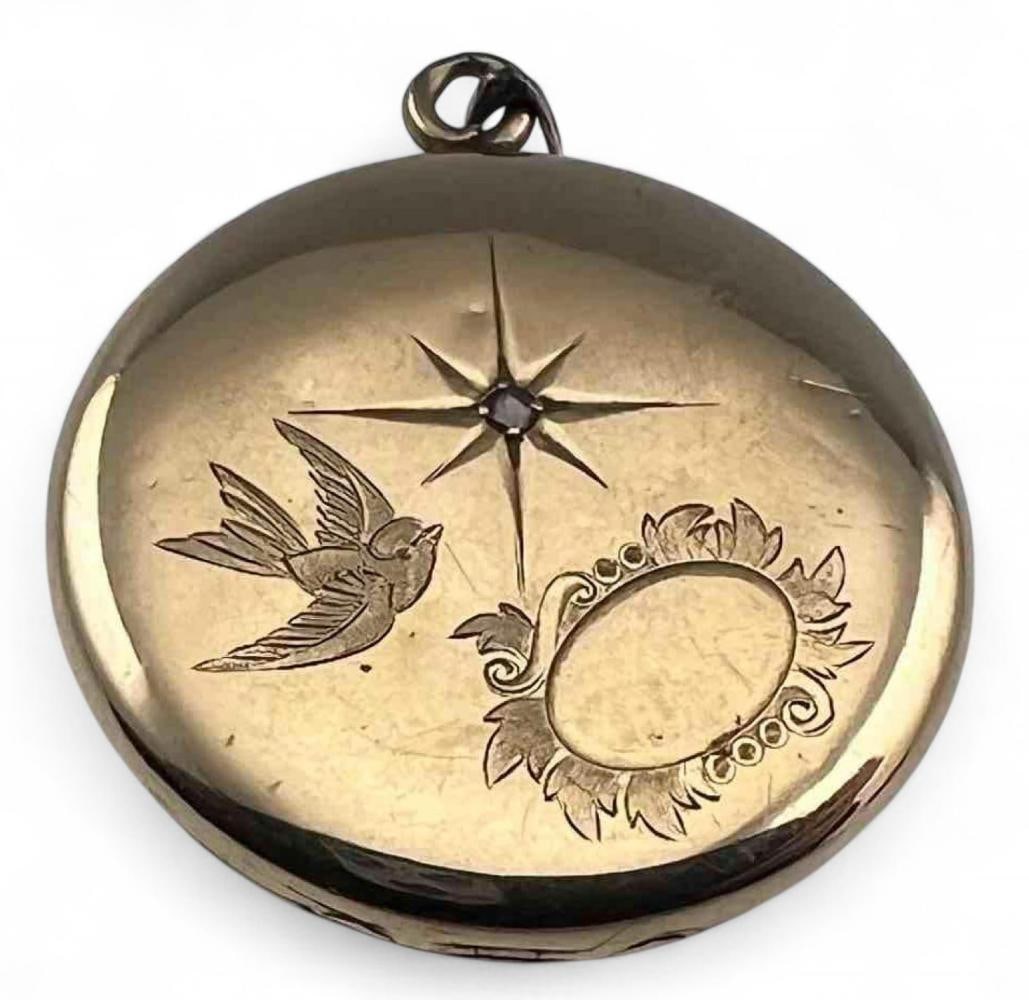 Antique 10K Diamond Locket With Sparrow & Star Motif: Antique 10K Diamond Locket With Sparrow & Star Motif, 5.6g. Marked "Elgin American Mfg Co. 10K." ALL CREDIT CARDS WILL BE MANUALLY VERIFIED PRIOR TO SHIPMENT.