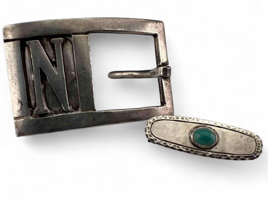 Sterling silver Turquoise Tie Clip & Belt Buckle With "N" Monogram: Sterling silver Turquoise Tie Clip & Belt Buckle With "N" Monogram, 29.1g. Marked "Sterling. Buckle approximately 2.125W x 1.375H in. Tie clip approximately 1.375L x 0.375W in.