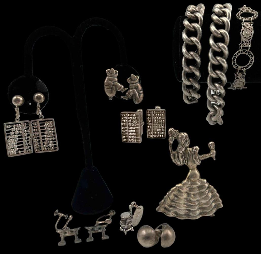 Sterling Silver Jewelry: Sterling Silver Jewelry, 102.7g. Marked or test as sterling. Includes bracelets, earrings, brooches, cuff links, and more. Largest bracelet approximately 9.0L x 0.53W in. Smallest piece (charm) approx