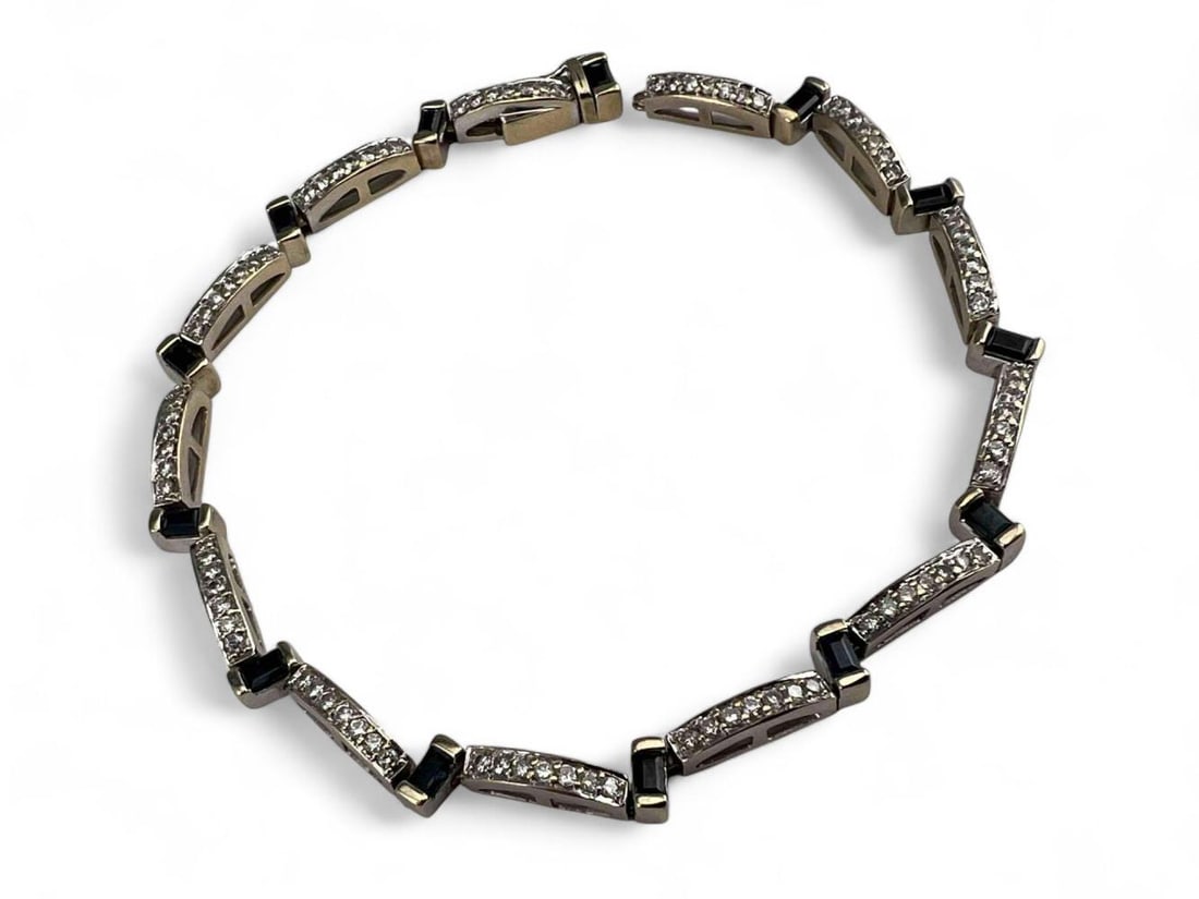 18K White Gold Diamond Sapphire Bracelet: 18K White Gold Diamond Sapphire Bracelet, 15.4g. Marked 18K, 750. In need of repair, as photographed. Length approximately 8.0in. Width approximately 5.0mm. ALL CREDIT CARDS WILL BE MANUALLY VERIFIED 