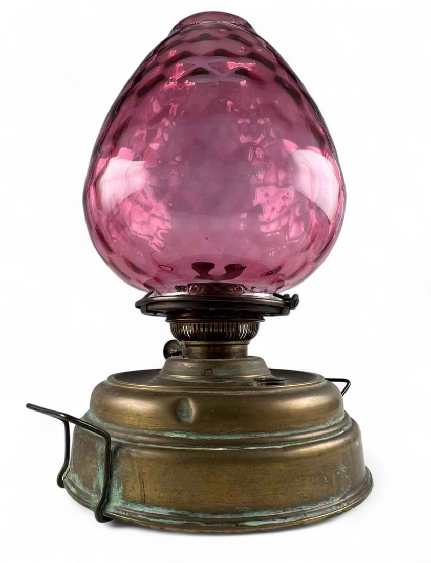 Late 19th Century Brass Heater Lamp With Cranberry Glass Shade: Late 19th Century Brass Heater Lamp With Cranberry Glass Shade. Base marked "Evered & Co. Victor Burner." Approximately 19.5H x 11.375W in. Shade approximately 12.0H x 10.875W in.