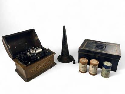 Edison Standard Cylinder Phonograph & Cylinder Records: Edison Standard Cylinder Phonograph With Oak Cabinet & Cylinder Records. Not currently in running condition. With closed case approximately 12.75L x 9.0D in. Records (in boxes) approximately 4.625H x