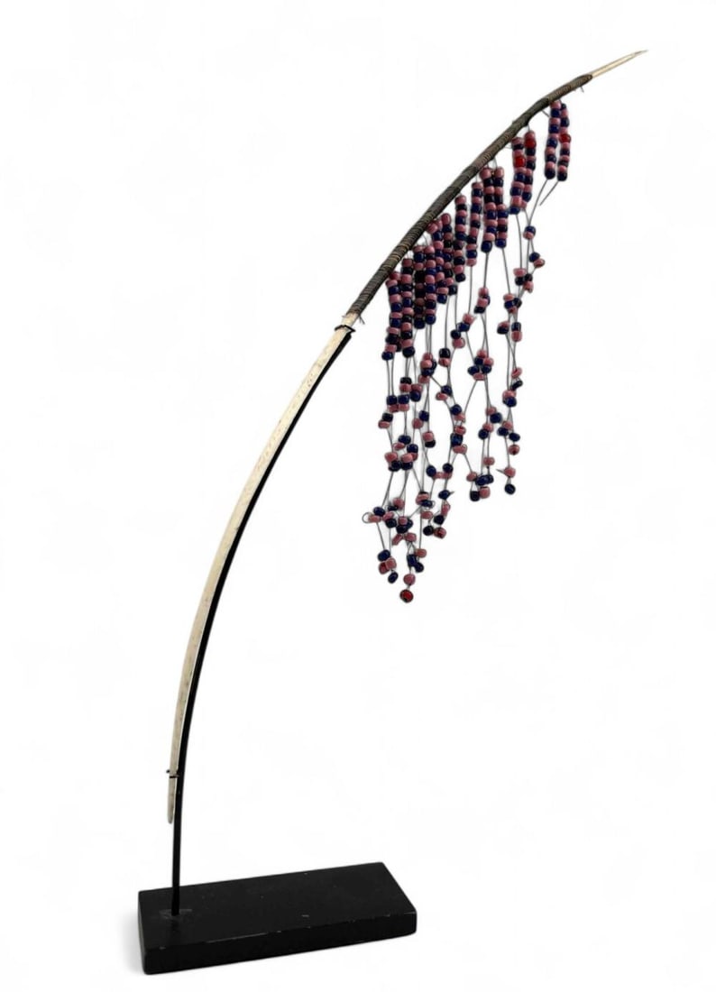 19th Century Zulu South African Bone, Wildebeest Hair & Glass Beaded Hair Pin: 19th Century Zulu South African Bone, Animal Hair & Glass Beaded Hair Pin. Approximately 11.375H x 0.25W in. (as mounted on stand). Provenance: Jacaranda Tribal, purchased 2008.