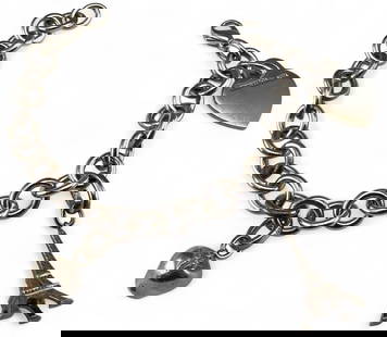 Tiffany & Co. Sterling Silver Charm Bracelet: Tiffany & Co. Sterling Silver Charm Bracelet, 48.3g. Marked "Tiffany and Co. Ag 925." Length approximately 8.0in. Tag charm approximately 1.0 x 0.8in. ALL CREDIT CARDS WILL BE MANUALLY VERIFIED PRIOR