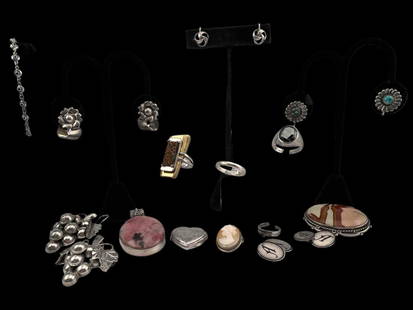 Lot Of Vintage Sterling Silver Jewelry: Lot Of Vintage Sterling Silver Jewelry, 114.4g. Weight excludes ring with brass details. Marked or test as sterling. Largest approximately 1.93H x 1.7W in. Approximate ring sizes 2.5-9.