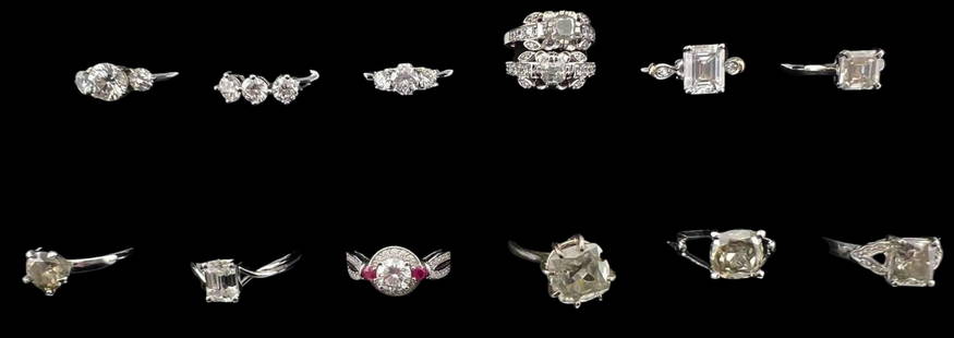 Lot Of Sterling Silver Moissanite Rings: Lot Of Sterling Silver Moissanite Rings, 37.7g. Marked 925. Largest moissanite approximately 10.7mm. Approximate ring sizes 7-8.