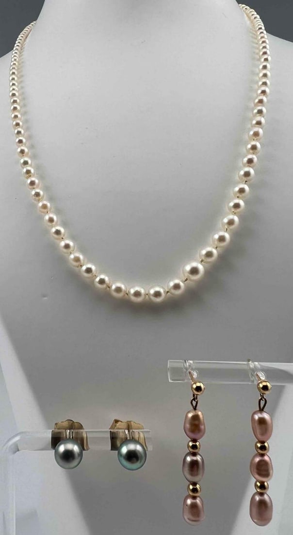 14K Pearl Necklace & Earrings: 14K Pearl Necklace & Earrings, 12.7g total weight. Marked 14K. Large sized earring backs 9.0mm, 0.8g. Pearl necklace length 18.5in. Largest pearl 5.8mm. Blue pearl earrings 6.7mm. ALL CREDIT CARDS WIL