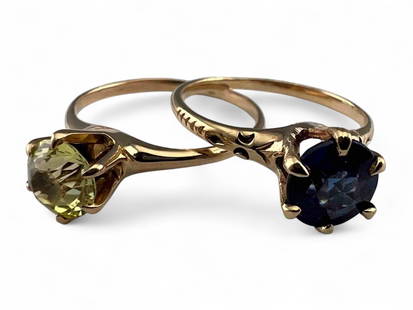Two 10K Blue & Yellow Sapphire Solitaire Rings: Two 10K Blue & Yellow Sapphire Solitaire Rings, 3.0g. Yellow sapphire ring marked "10K," Blue sapphire ring unmarked, tests as 10K. Yellow sapphire approximately 5.7mm. Blue sapphire approximately