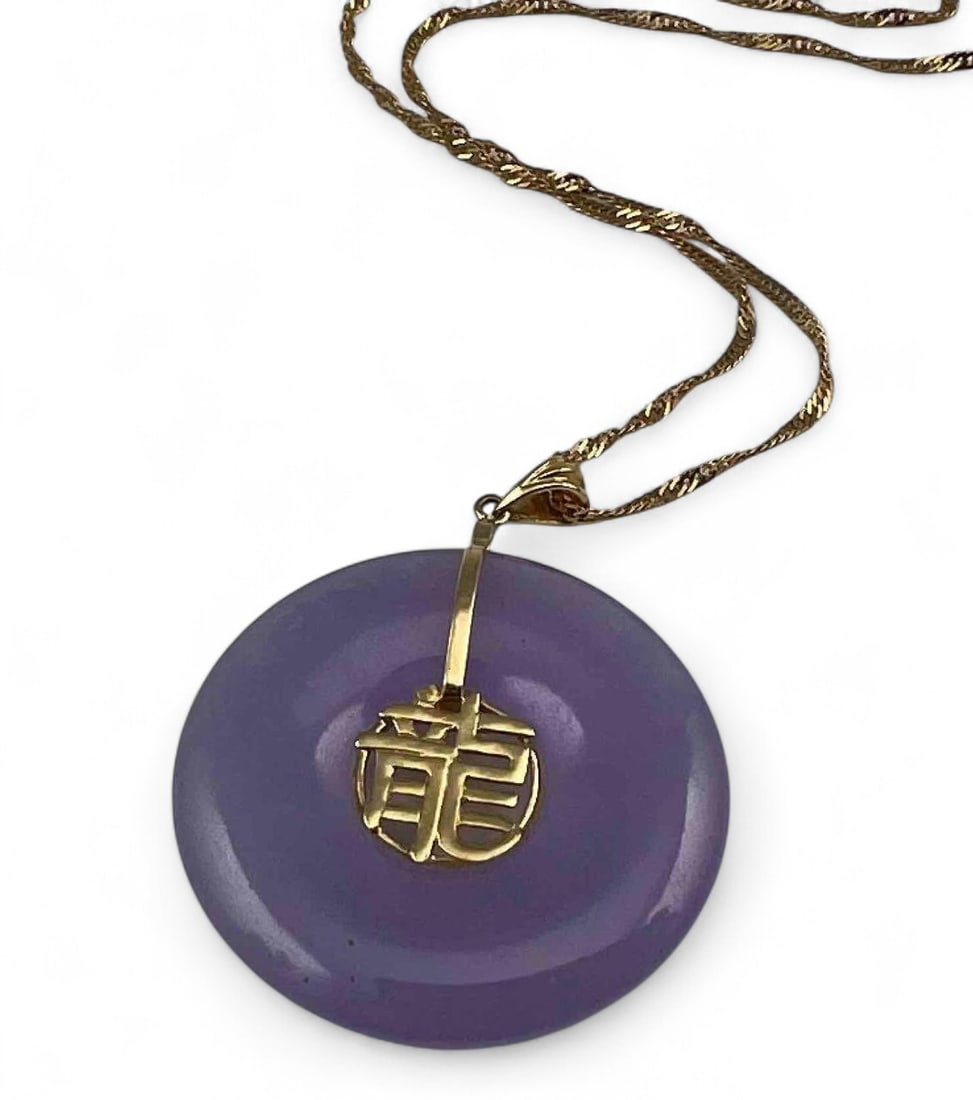 14K Lavender Jade Necklace: 14K Lavender Jade Necklace, 9.1g total weight. Chain 1.2g. Chain marked "14K Italy." Pendant marked "14K." Pendant approximately 1.18in. Chain length approximately 16.0in. ALL CREDIT CARDS WILL BE MAN