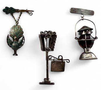 Three Unusual Silver Brooches: Three Unusual Silver Brooches, 26.2g. Two marked "Mexico Silver." Peacock unmarked. All test between 85 and 91 percent silver. Largest approximately 2.0L x 1.125W in. Railroad lantern brooch