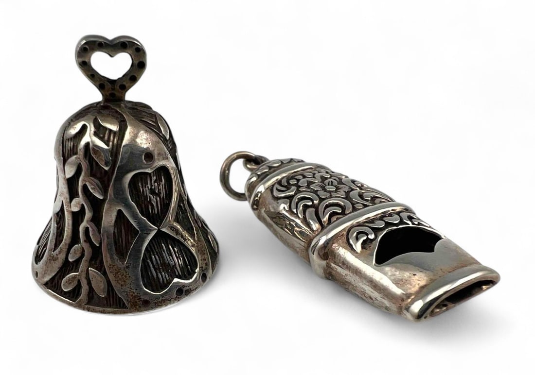 Sterling Silver Bell & Whistle Pendants: Sterling Silver Bell & Whistle Pendants, 23.9g. Marked "Sterling," 925. Bell approximately 1.125H x 1.0W in. Whistle approximately 1.5L x 0.625W in.