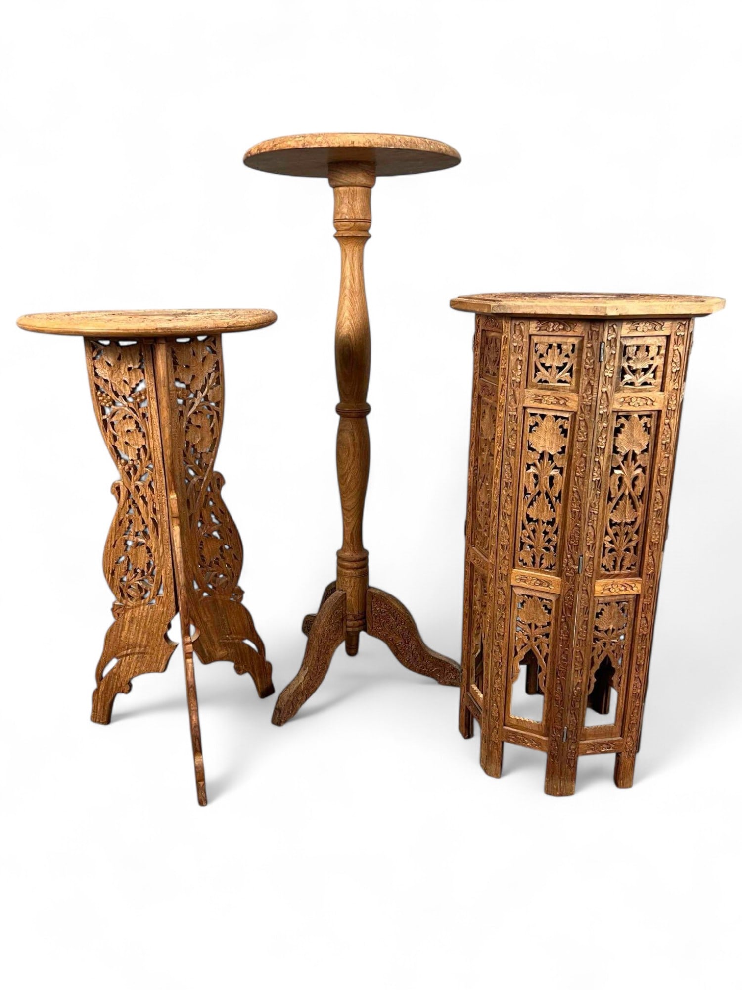 Three Indian Carved Wood Plant Stands: Three Indian Carved Wood Plant Stands. Approximately 40.0H x 14.75W in.; 30.75H x 15.0Win.; 30.0H x 15.125W in.
