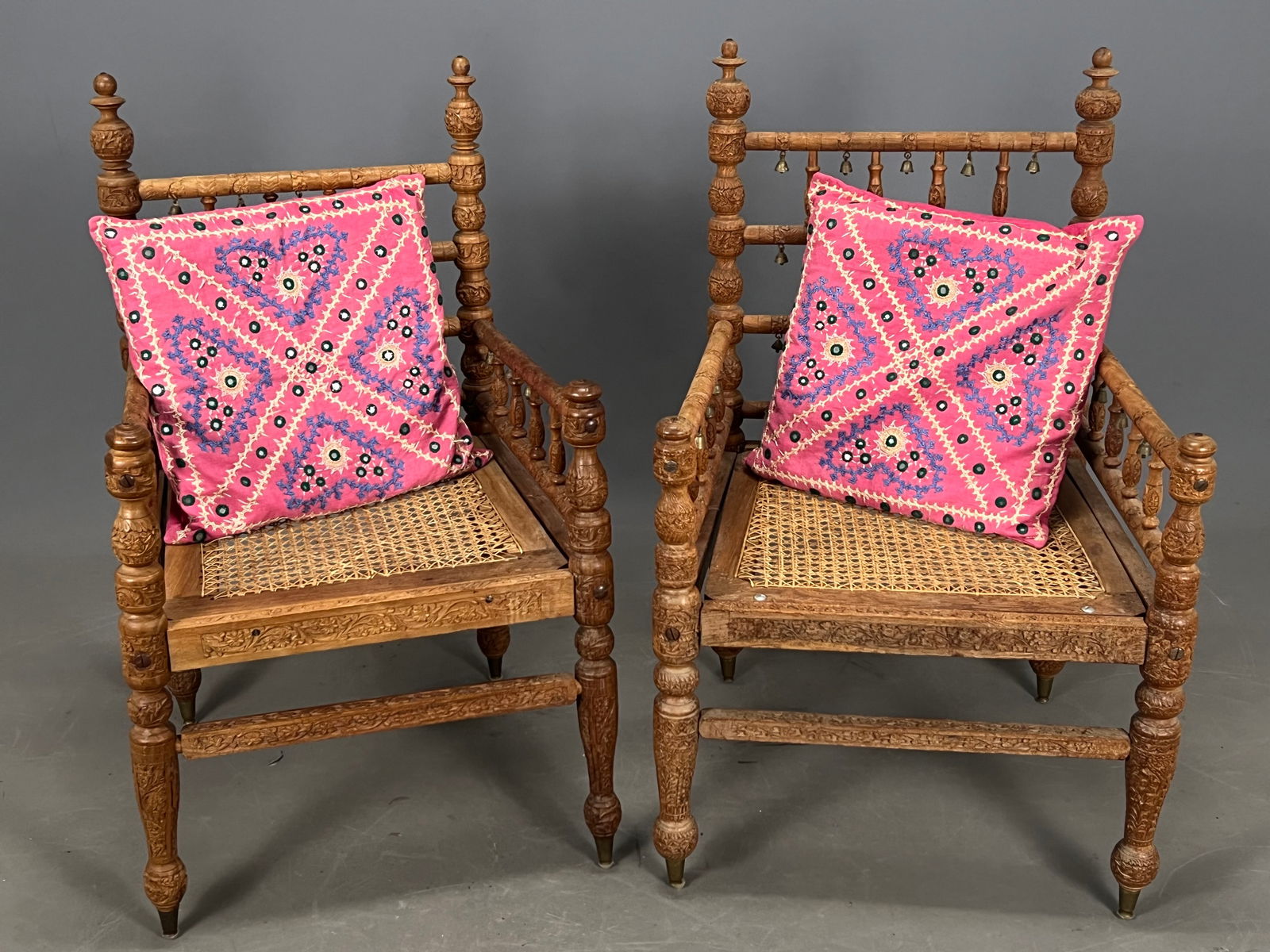 Pair Of Punjabi Wedding Chairs: Pair Of Carved & Caned Indian Punjabi Wedding Chairs With Bells. Each approximately 36.5H x 23.0W x 20.0D in.
