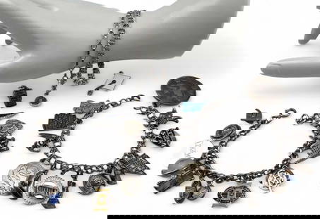 Sterling Silver Charms & Charm Bracelets: Sterling Silver Charms & Charm Bracelets, 106.8g. Bracelets and charms marked or test as sterling. Includes four bracelets and thirty charms. Largest charm approximately 1.30in. Smallest charm approxi