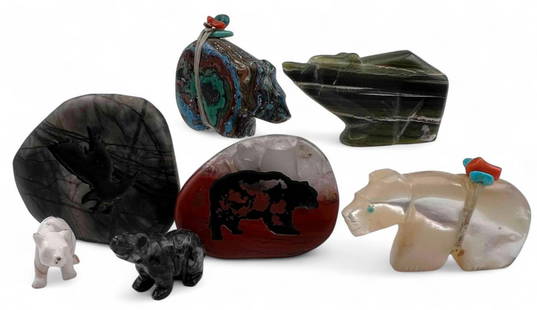 Grouping Of Zuni Bear Fetishes & Stone Carvings: Grouping Of Zuni Bear Fetishes & Stone Carvings. Mother of pearl, coral, and turquoise bear signed "FK Zuni." Largest?approximately1.75L x 1.375W in. Smallest approximately 1.0L x 0.375H x 0.3125W in.