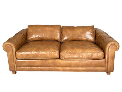 Two Seat Tan Leather Sofa: Two Seat Tan Leather Sofa. Approximately 72L x 40.0D x 26.25H in.