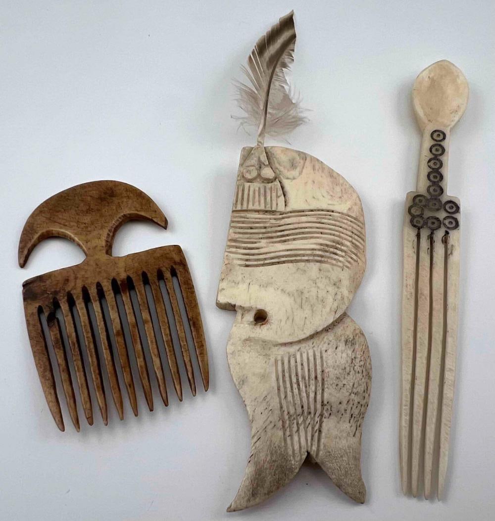 Tribal Bone Hair Combs & Ornament: Tribal Bone Hair Combs & Ornament. Zulu incised bone comb and snuff spoon approximately 4.875L x 0.5W in. Bone hair comb approximately 2.75L x 1.625W in. Bone fish shaped ornament approximately 3.625L
