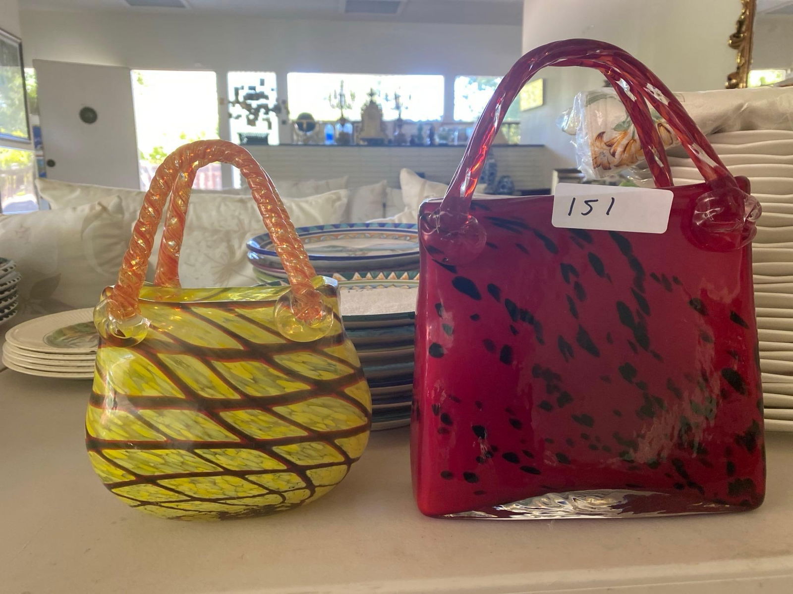 Two Art Glass Purse Form Vases: Two Art Glass Purse form vases.