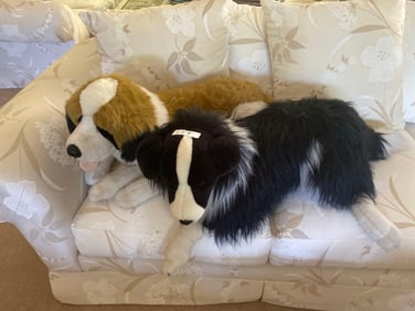 Two Oversized Stuffed Dogs