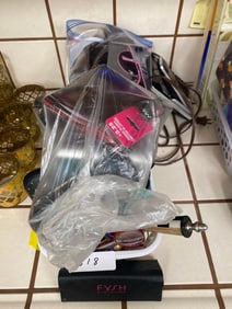 Many Pairs Of Eyeglasses. And Landline Phone
