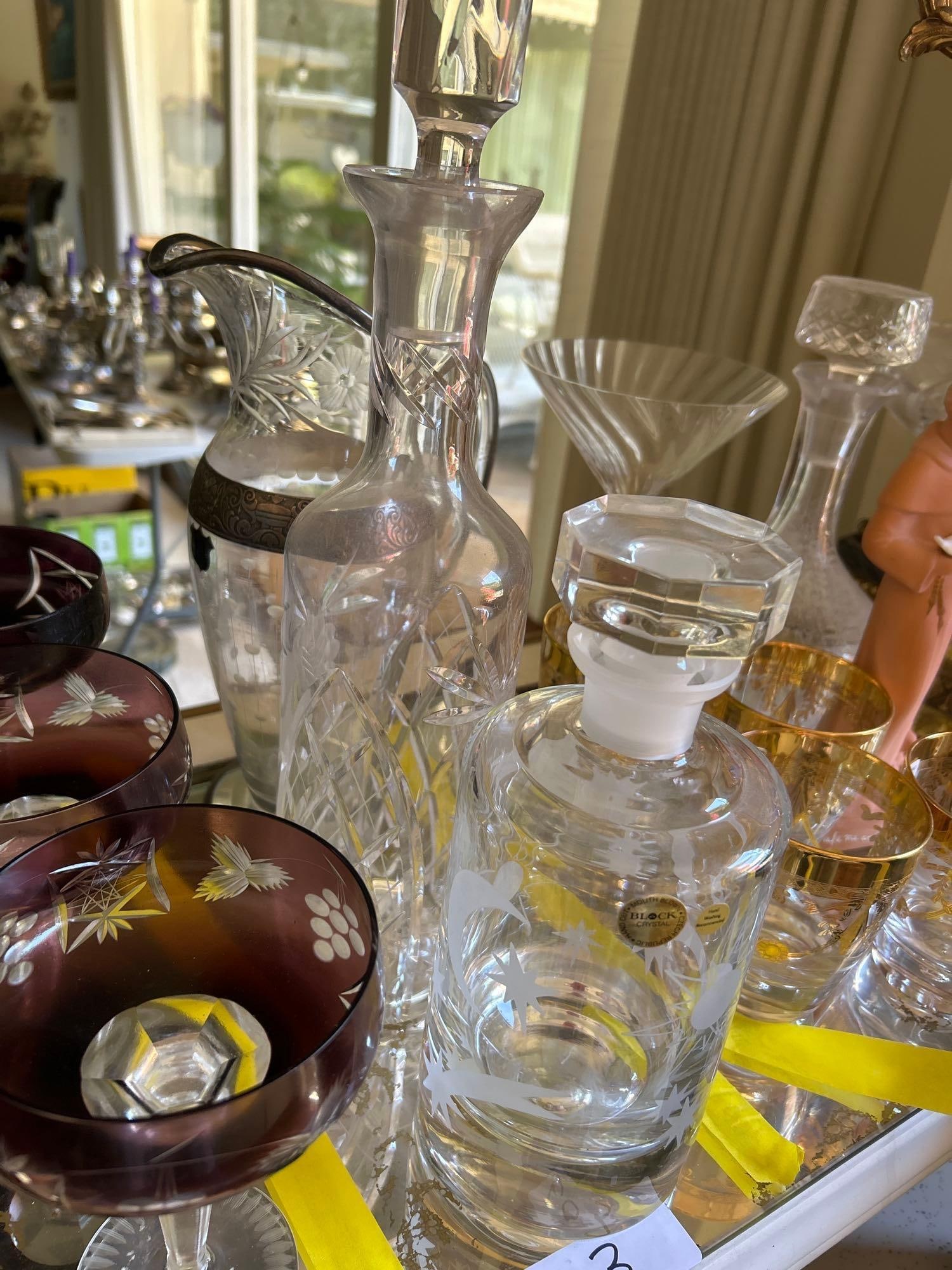 Crystal Decanters With Silver Overlay Pitcher: Crystal decanters with silver overlay pitcher.