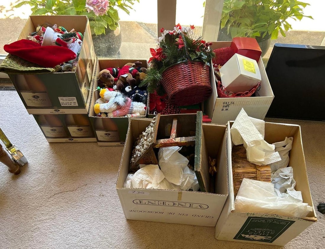 Seven Boxes Of Christmas Decor And Ornaments: Seven boxes of Christmas decor and ornaments.