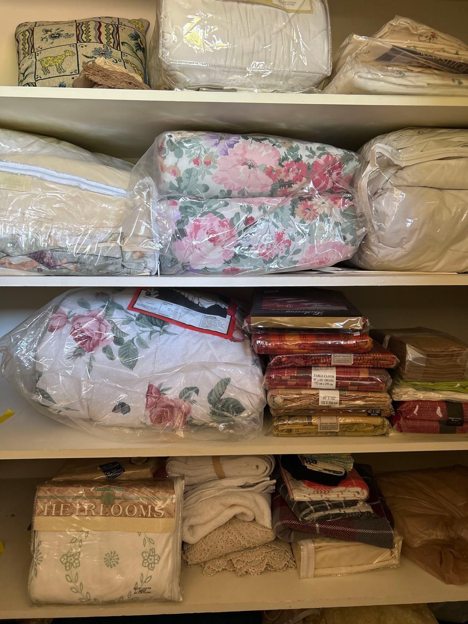 Four Shelves Of Linens Many New In Package: Four shelves of linens many new in package. Right side of closet.