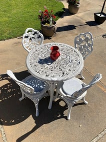 Four Piece Plastic Patio Set.