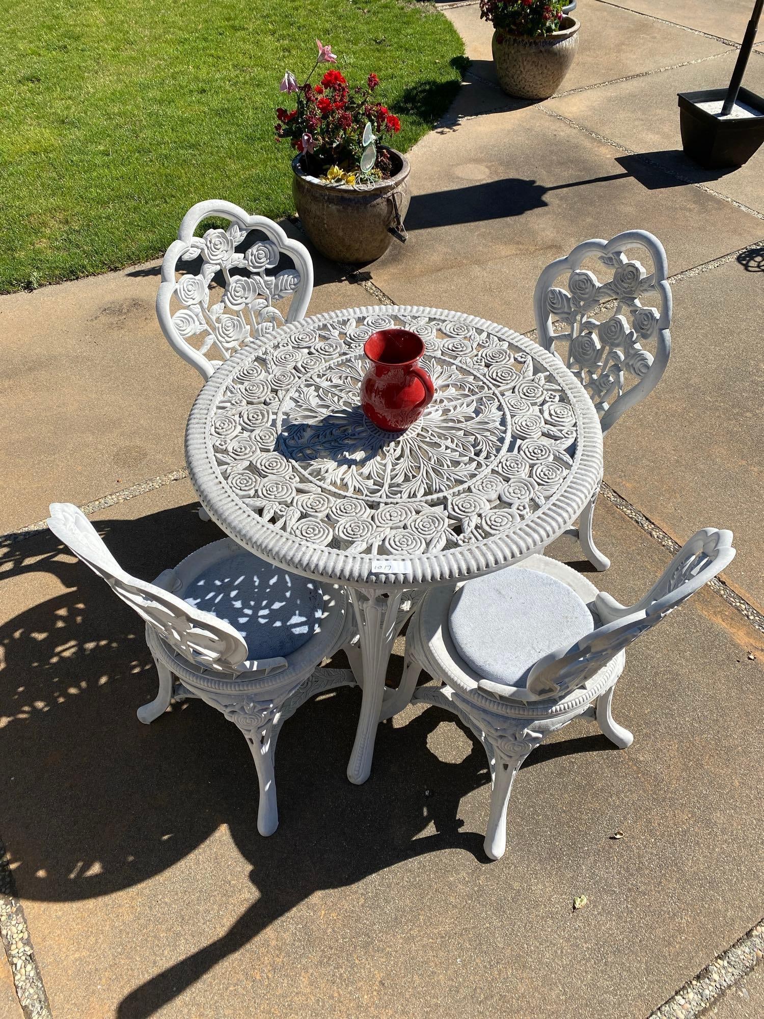 Four Piece Plastic Patio Set. (1 of 2)