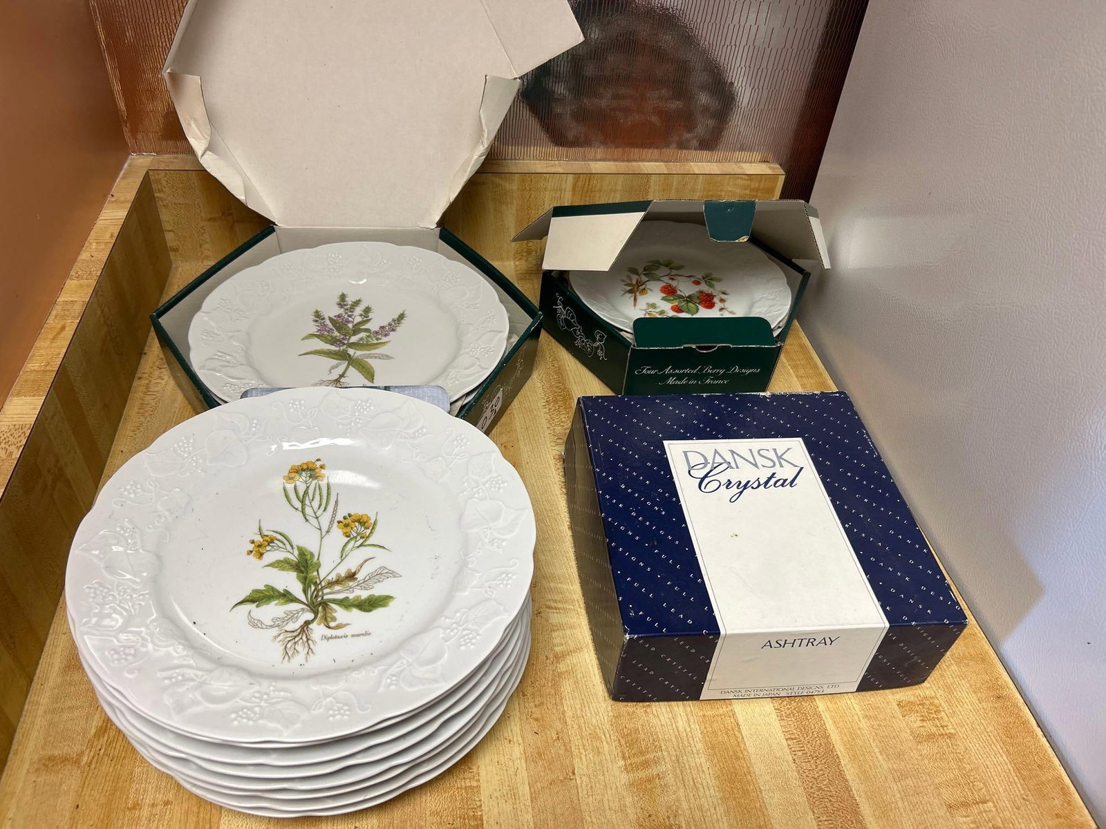 Grouping Of Dansk Porcelain Luncheon Plates And Crystal: Grouping of Dansk porcelain luncheon plates and Crystal.
