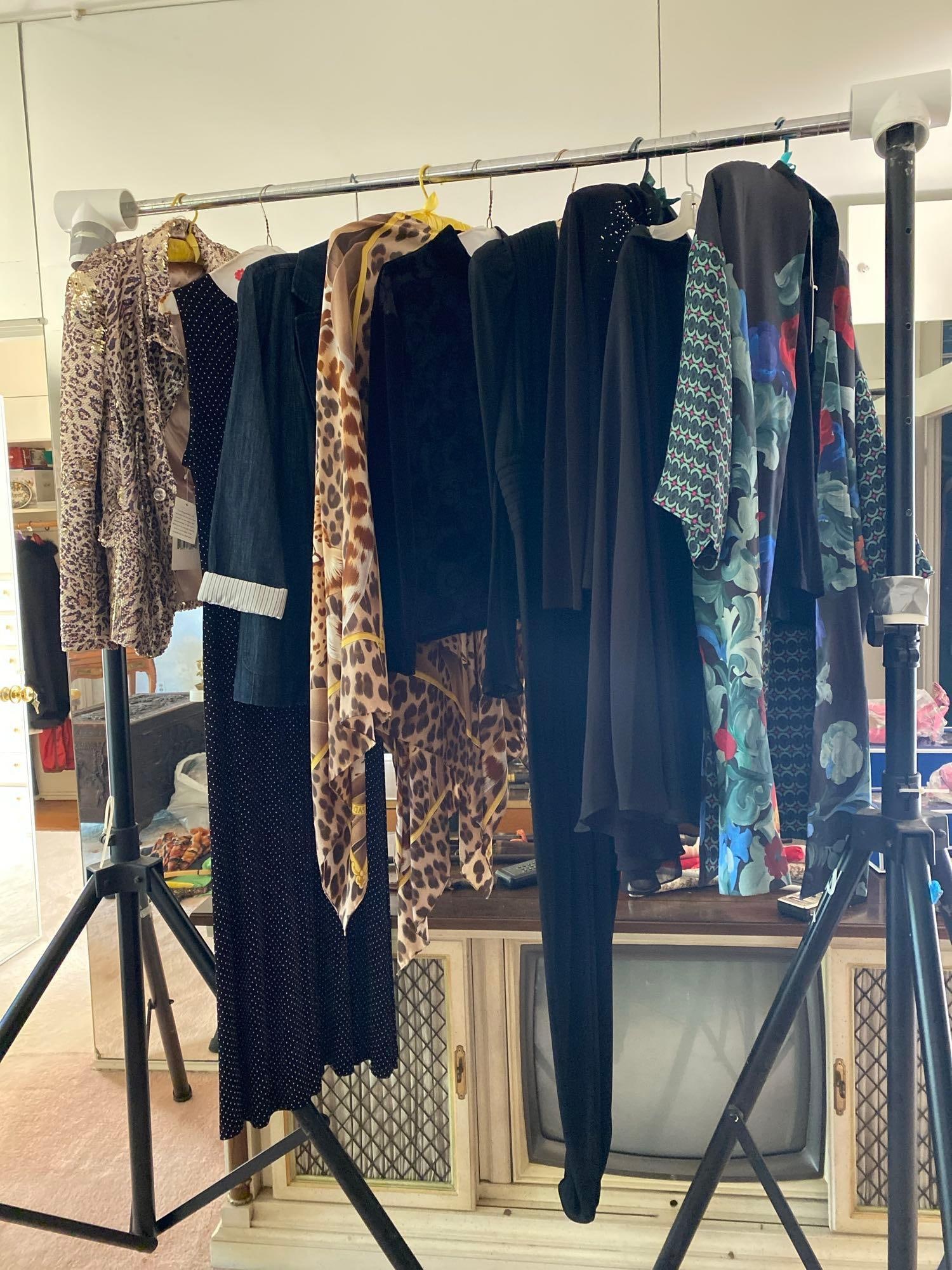 Lot Of Ladies Clothing, Including Blazers, Dresses, And More: Lot of ladies clothing, including blazers, dresses, and more. Approximate size medium.
