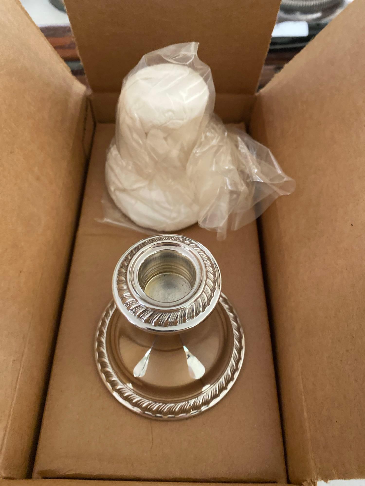 Pair Of Gorham Sterling Silver Candlesticks, New In Box: Pair of Gorham sterling silver candlesticks, new in box. ALL CREDIT CARDS WILL BE MANUALLY VERIFIED PRIOR TO SHIPMENT.