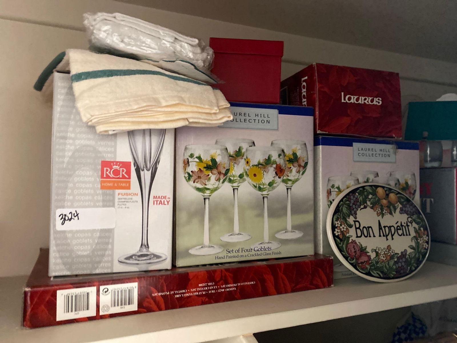 Glassware And Dish Towels: Glassware and dish towels.