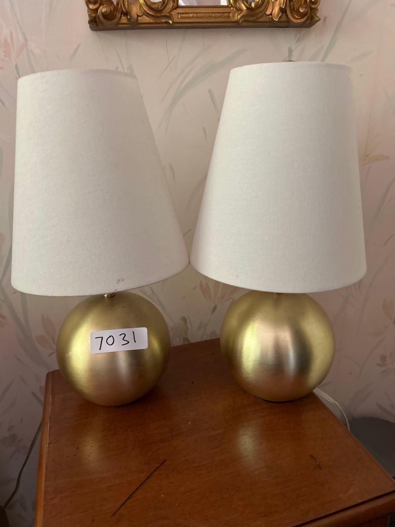 Pair Of Gold Table Lamps.: Pair of gold table lamps.