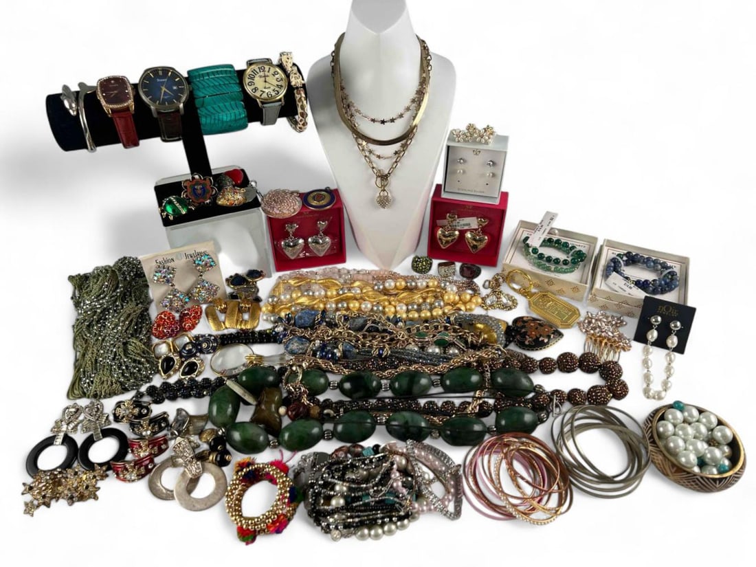 Large Lot Of Costume Jewelry: Large Lot Of Costume Jewelry. includes necklaces, rings, brooches, watches, bracelets, earrings, and more.