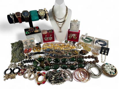 Large Lot Of Costume Jewelry: Large Lot Of Costume Jewelry. includes necklaces, rings, brooches, watches, bracelets, earrings, and more.