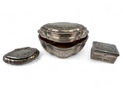 Three Sterling Silver Boxes: Three Sterling Silver Boxes, 63.4g total weight. Test as sterling. Largest approximately 2.25L x 1.63W x 1.1H in. Square box approximately 1.0L x 0.85W x 0.47H in. Smallest approximately 1.48L x 0.92W
