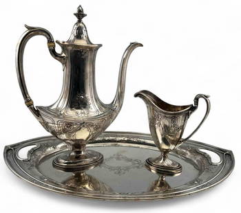 Gorham Sterling Silver Tea Set: Gorham Sterling Silver Partial Tea Set, 1469.5. Marked "Sterling A11314/1." Platter approximately 15.75L x 9.875W in. Teapot Approximately 10.5H x 8.0L x 2.875W in. Creamer approximately 5.25H x 4.625