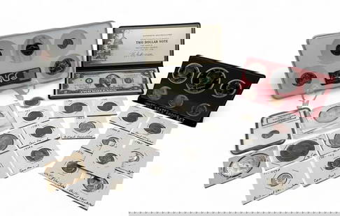 Collection Of Silver Dollars, Coins & Currency: Collection Of Silver Dollars, Coins & Currency. Includes: Mexican Silver Five Peso Coin; 1967 Canadian Flying Goose Silver Dollar; British Columbia1958 Totem Pole Silver Dollar, 2003 uncirculated silv
