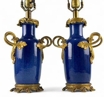 Pair Of Louis XVth Style Gilt Bronze Mounted Powder Blue Porcelain Table Lamps: Pair Of Louis XVth Style Gilt Bronze Mounted Powder Blue Porcelain Table Lamps. Each approximately 15.75H x 7.875W x 5.0D in.