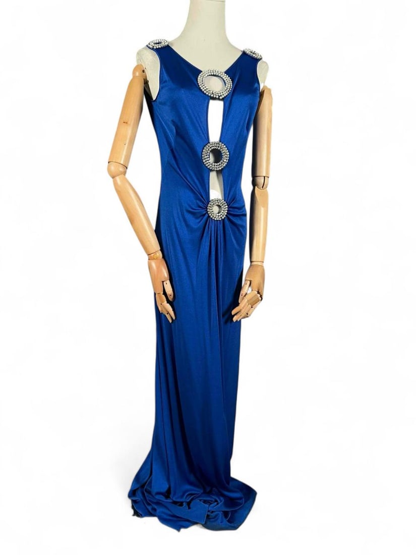 Loris Azzaro Blue Jersey Evening Gown, Ca. 1970's: Loris Azzaro Blue Jersey Evening Gown. Features plunging neckline, rhinestone details, and low back. Total length approximately 57 inches. Bust approximately 34 inches. Waist approximately 26 inches.