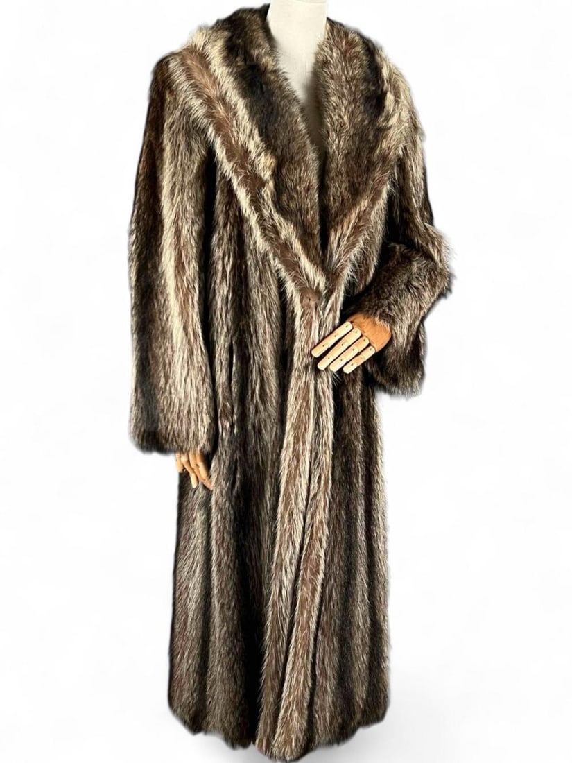 Full Length Raccoon Fur Coat: Full Length Raccoon Fur Coat. Total Length approximately 48 inches. Chest approximately 43.0in. Sleeve length approximately 27.0 inches. Please note that professional cleaning is recommended for all f